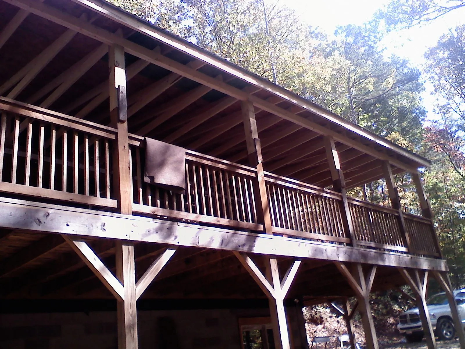 Timber framing under a new elevated porch and deck — Roof Leak Repair in Joliet by Roofing Brothers